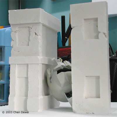 [Another view of the buildings. Note that some of the incomplete castings will become 'cracks' in the final building.]